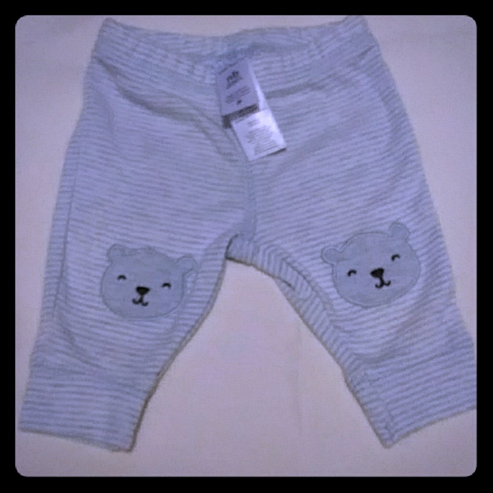Light blue striped pants with animal face